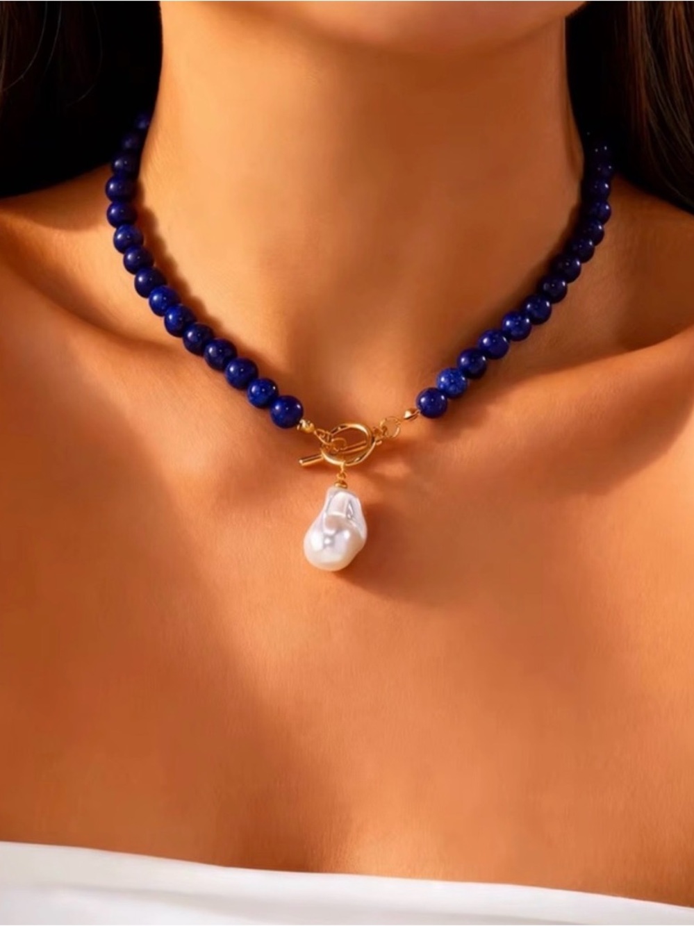 Elegant Blue Beaded Necklace with Gold Clasp
